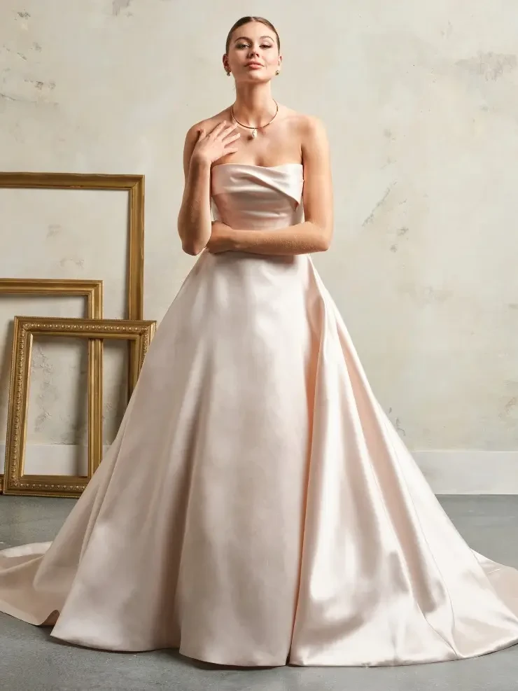 Photo of the model wearing a bridal gown