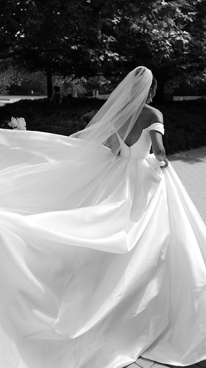 Photo of the model wearing a bridal gown